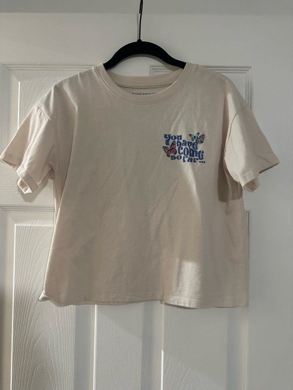 Cream Kids Short Sleeve Tee with Blue Butterfly Graphic EUC